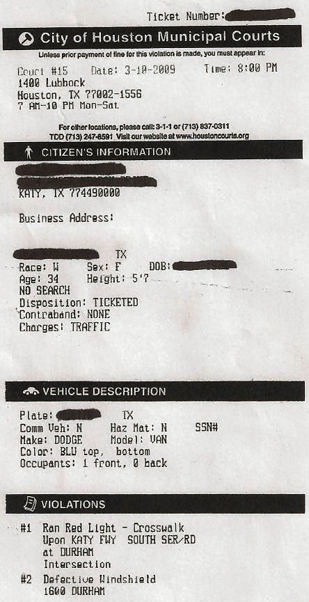 traffic ticket for ran red light and cracked windshield or defective windshield